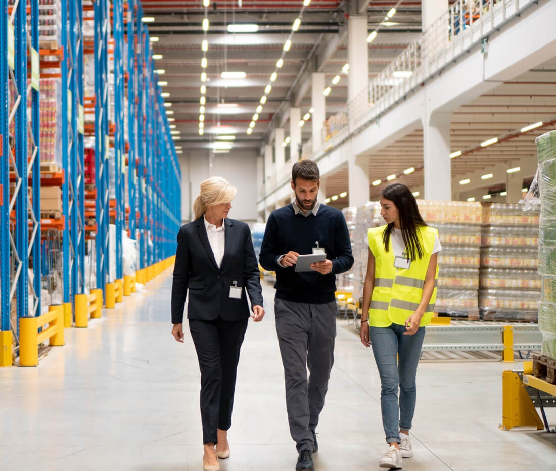 Warehouse supervisor overseeing distribution team